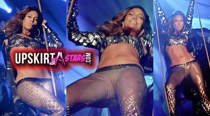 Jennifer Lopez’s hairless pussy is visible beneath her thin, sheer tights
