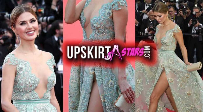 Victoria Bonya is dazzling with her beauty in Cannes, and her panties is visible from under her slit dress