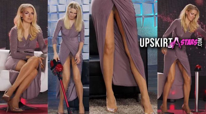Anne-Kathrin Kosch’s panties are visible in her sexy dress with a front slit